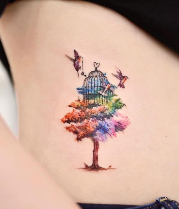 Bellissimo tatuaggio con uccello, gabbia e albero della vita di @tattoo_of_jangmah