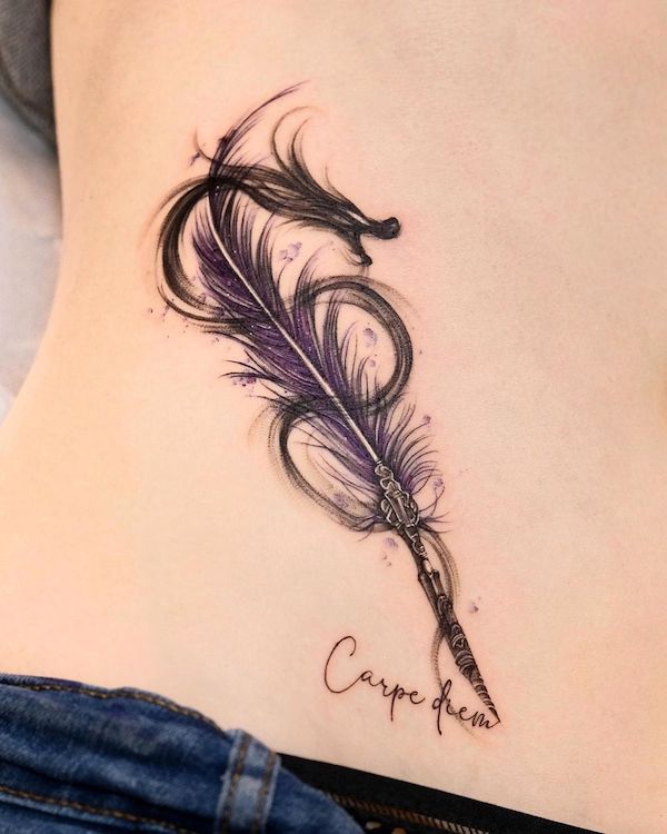 Tatuaggio con drago e piume di @suryo.tattoo