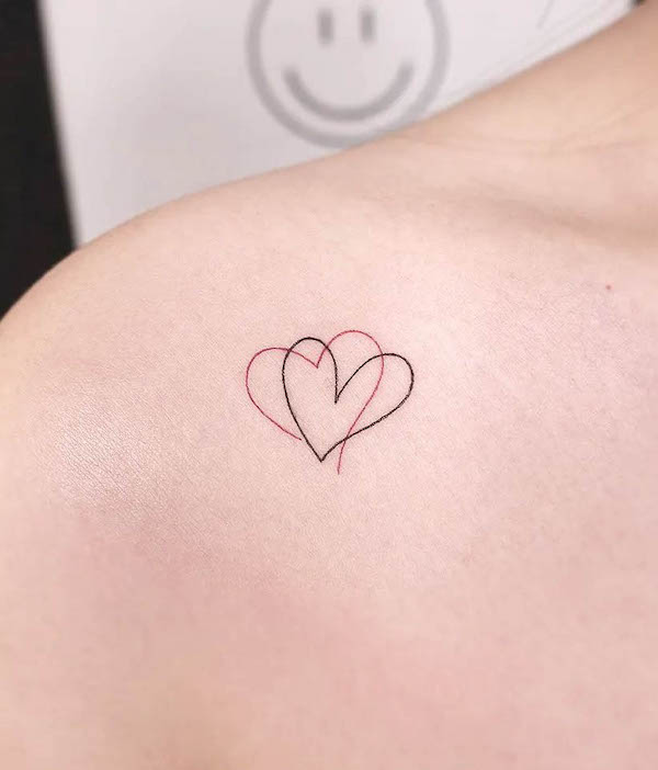 Tatuaggio con due cuori di @gorae_tattoo