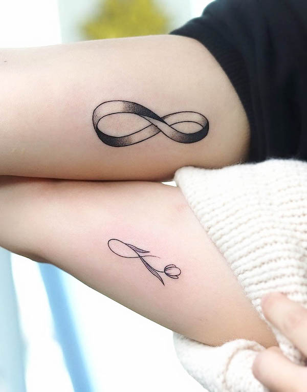 Tatuaggi bicipiti infiniti abbinati di @tatuatore_dogy