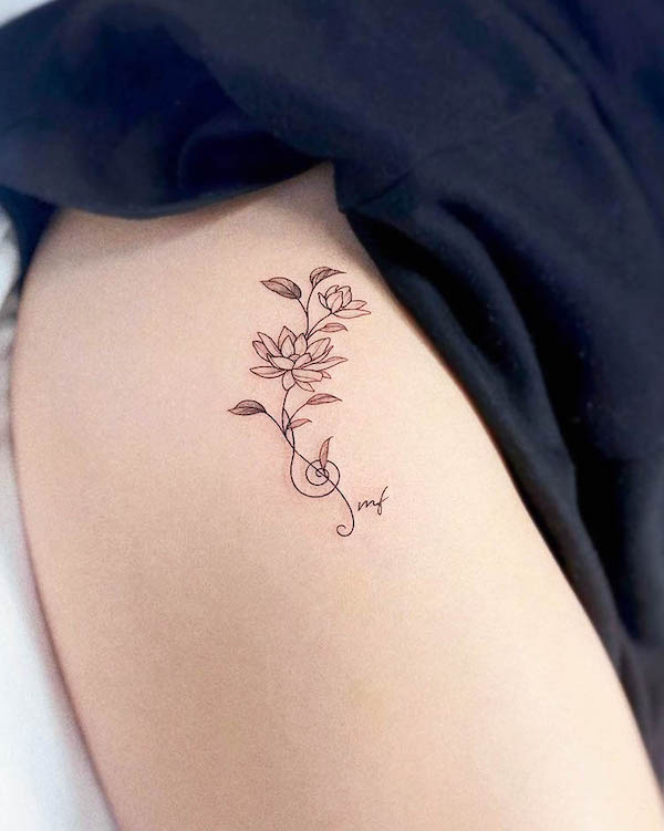 Tatuaggio Lotus per gli amanti della musica di @yeowool_tattooer