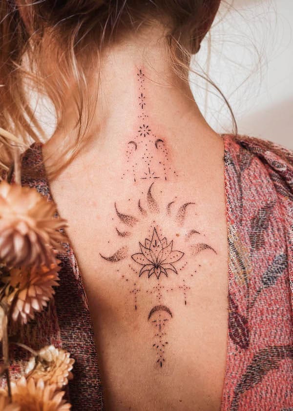 Splendido tatuaggio del sole sulla schiena di @lunae.magic