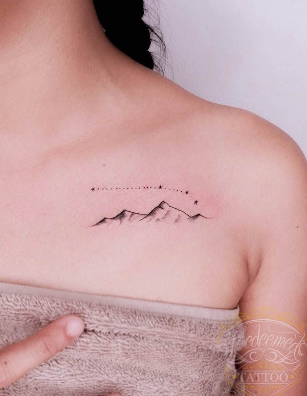 Tatuaggio con segno zodiacale e montagna di @jello_t