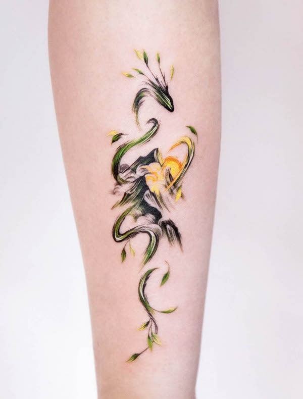 Tatuaggio con drago e montagne di @tattooist_zela