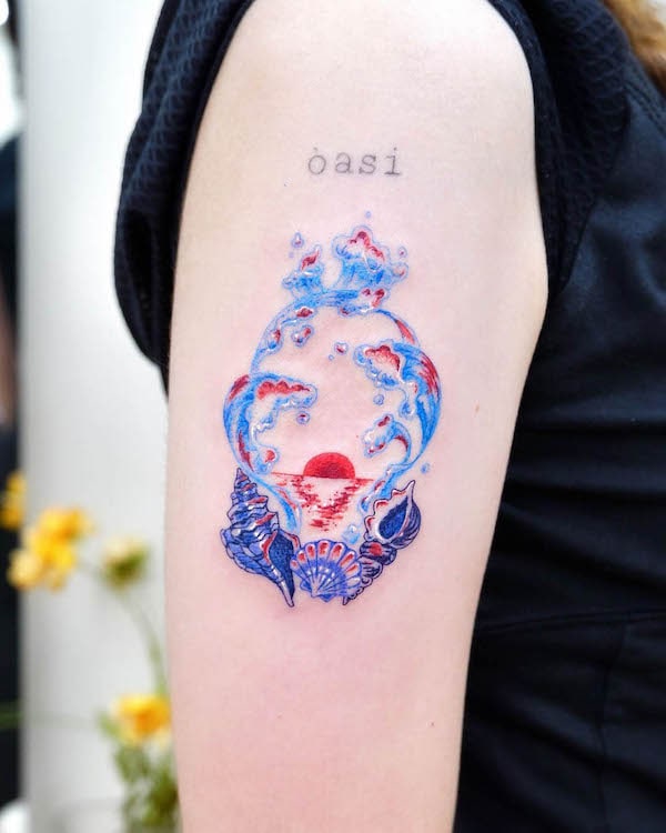Tatuaggio acqua e sole di @second.pin