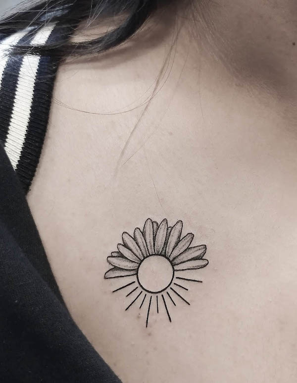 Tatuaggio con girasole e sole di @rebelkumar148