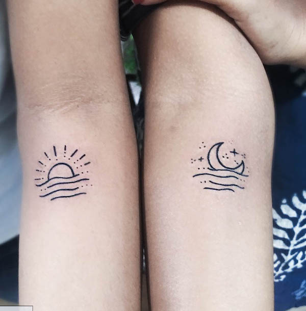 Tatuaggi con sole e luna sull'oceano di @v_inked
