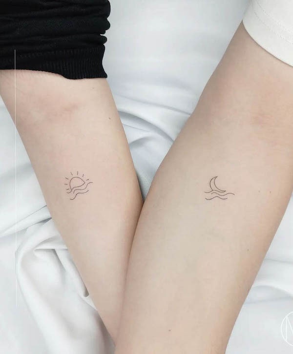 Tatuaggio con sole e luna di @izmit.ink