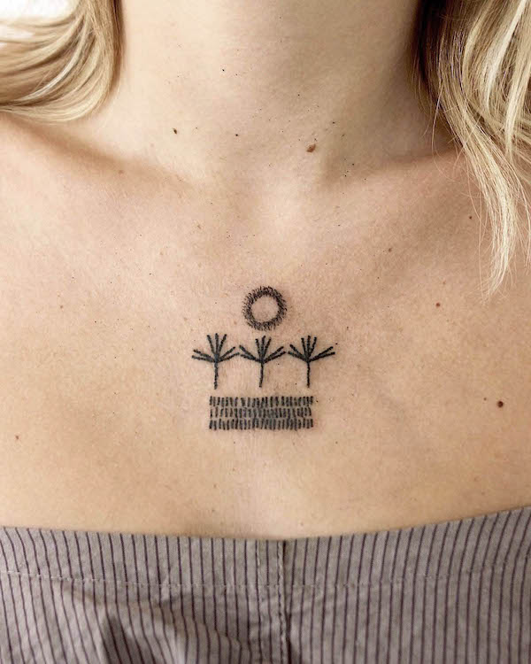 Tatuaggio con sole e piante di @corrieforeman