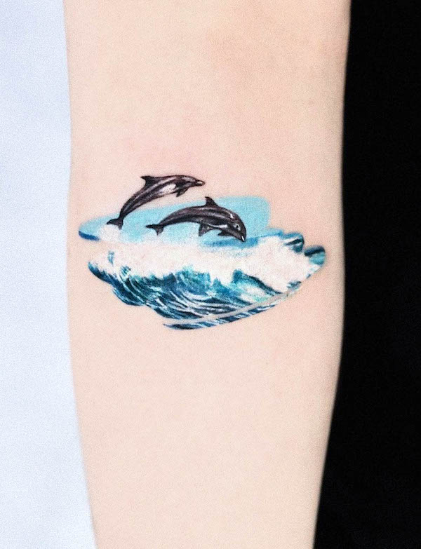 Tatuaggio Dolphins di @tattooist_mul