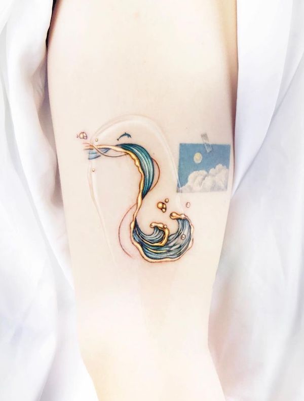 Tatuaggio a onde metalliche di @tattooist_toma