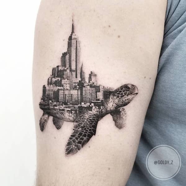 Tartaruga e paesaggio tatuato da @goldy_z