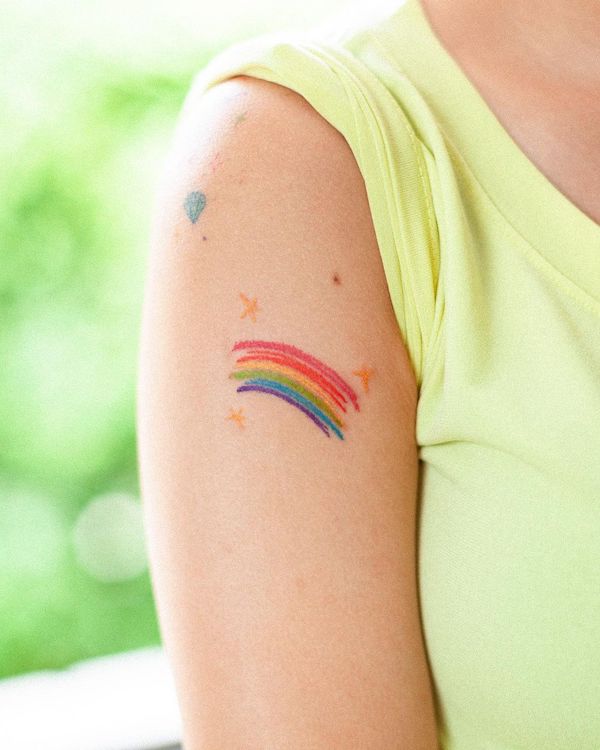 Tatuaggio arcobaleno della rinascita di @zedtattoo