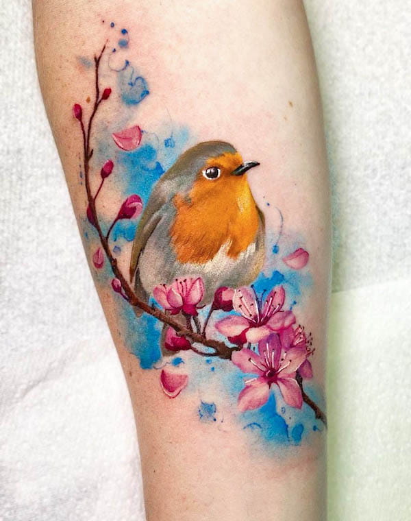Stupendo tatuaggio di pettirosso ad acquerello di @bycamilaconti