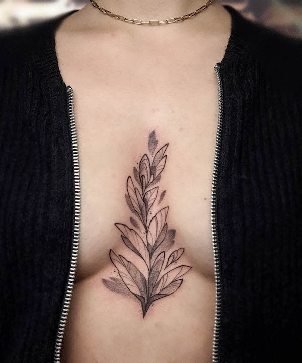 Foglie tra il seno tatuaggio da @melli.mrk_.tattoo
