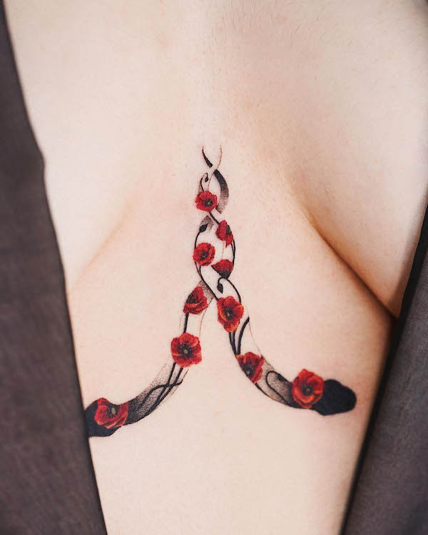 Serpenti doppi di @fluffy_tattoo