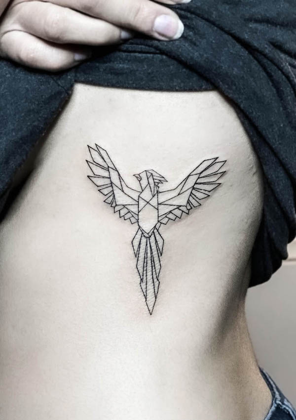 Tatuaggio geometrico della fenice da @phoenix tattoos by @yai_tatts