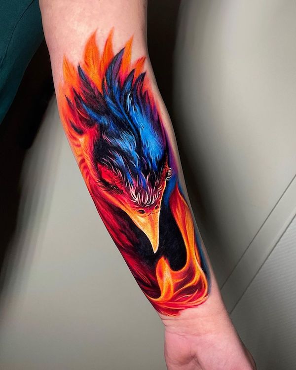 Realismo fuoco fenice tatuaggio da @adrienn.kern_