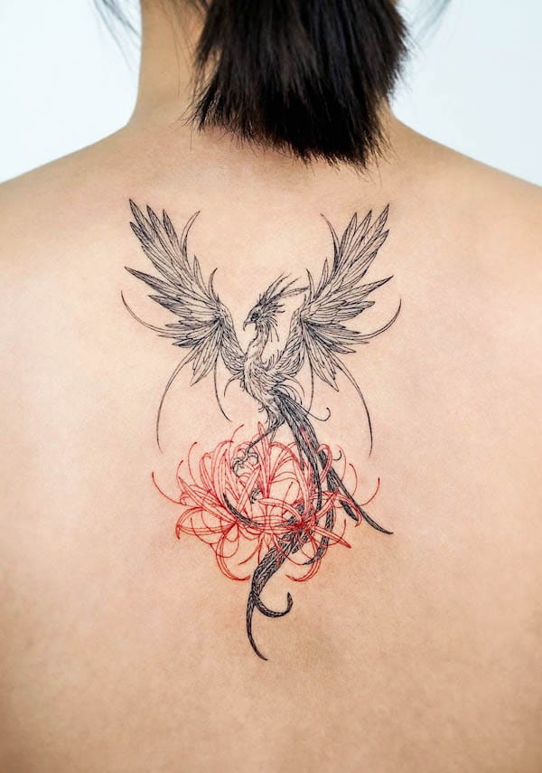 Tatuaggio Phoenix e fiore di @bium_tattoo