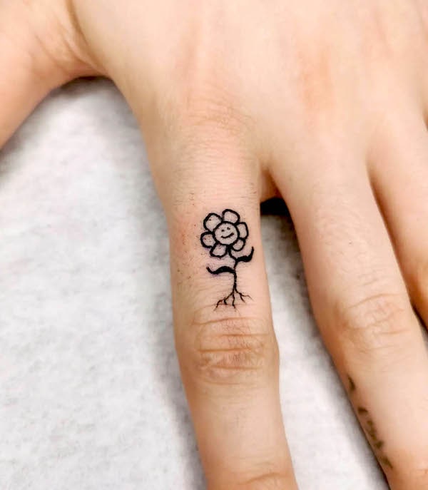 Il fiore danzante, simpatico tatuaggio a mano di @oeltattoo