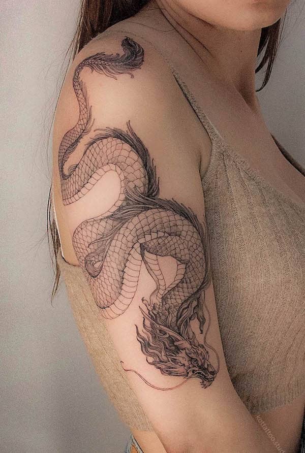 Tatuaggio con manica di drago di @kottattoo.studio
