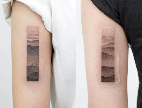 Tatuaggi di paesaggi montani abbinati di @zoi.tattoo