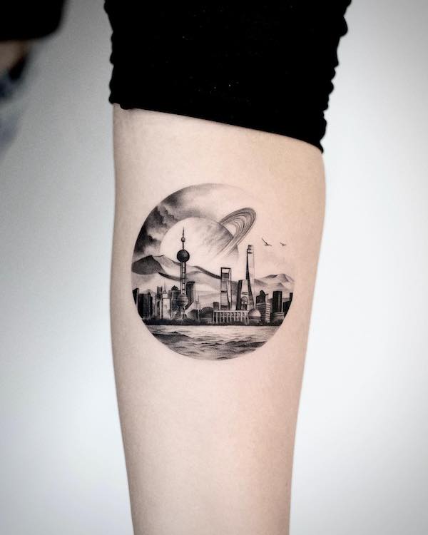 Tatuaggio del paesaggio di Shanghai di @besign.ttt