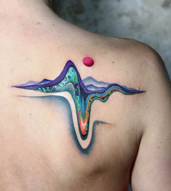 Peek in the core - tatuaggio di paesaggio concettuale di @katia.zuela