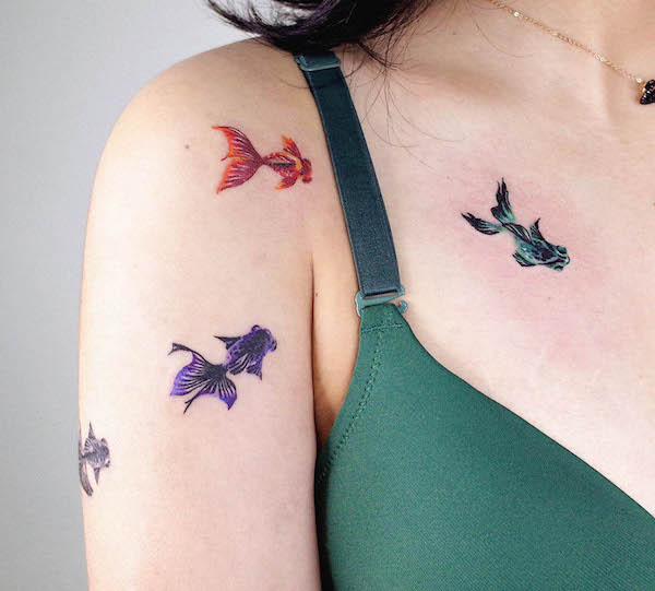 Tatuaggi di pesci rossi da @soosoo.tattoo
