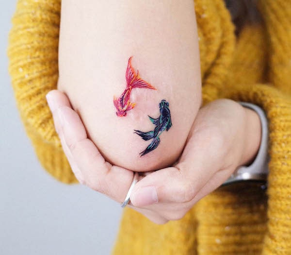 Copertura della cicatrice del pesce rosso di @soosoo.tattoo