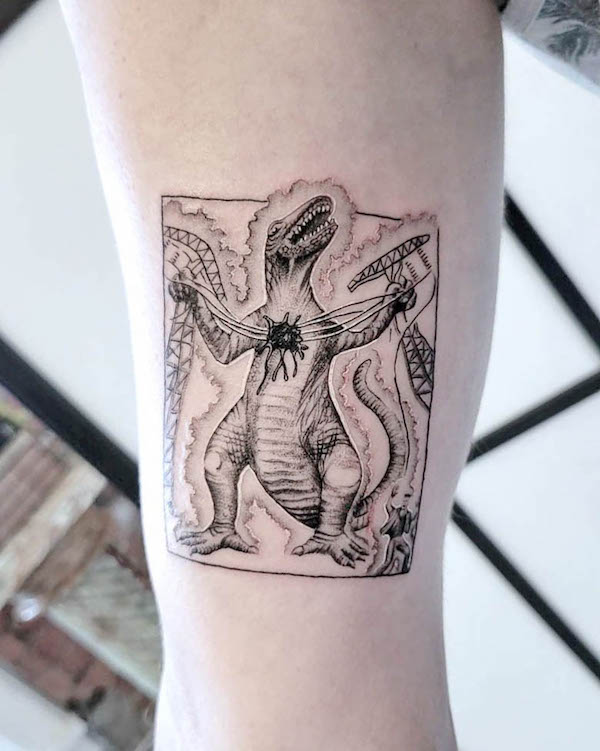 Accattivante tatuaggio di Godzilla di @cadecran
