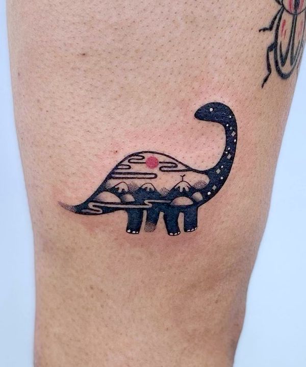Tatuaggio di dinosauro in stile giapponese da @flow_tattoo_toronto