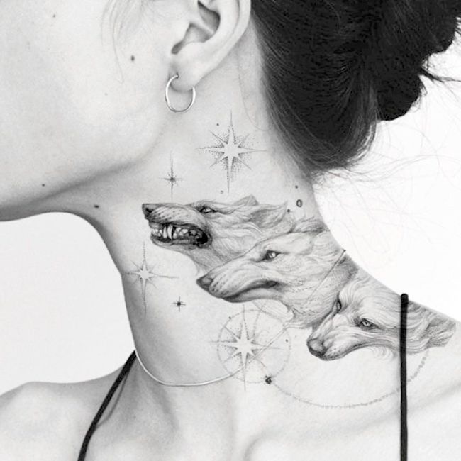 Tatuaggio Wolves sul collo di @masa__island