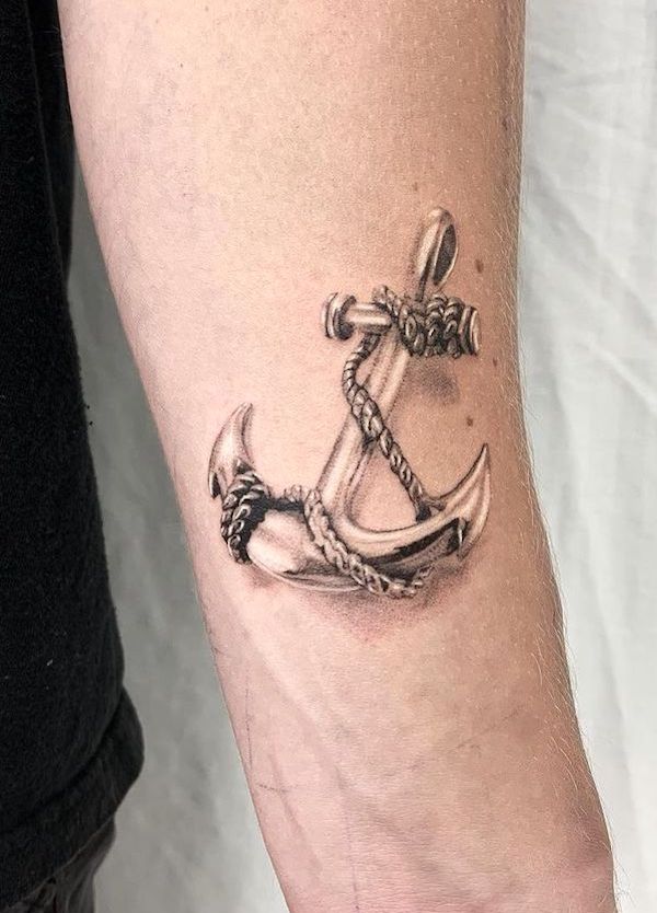 Tatuaggio con ancora sul polso di @__yyhyy__