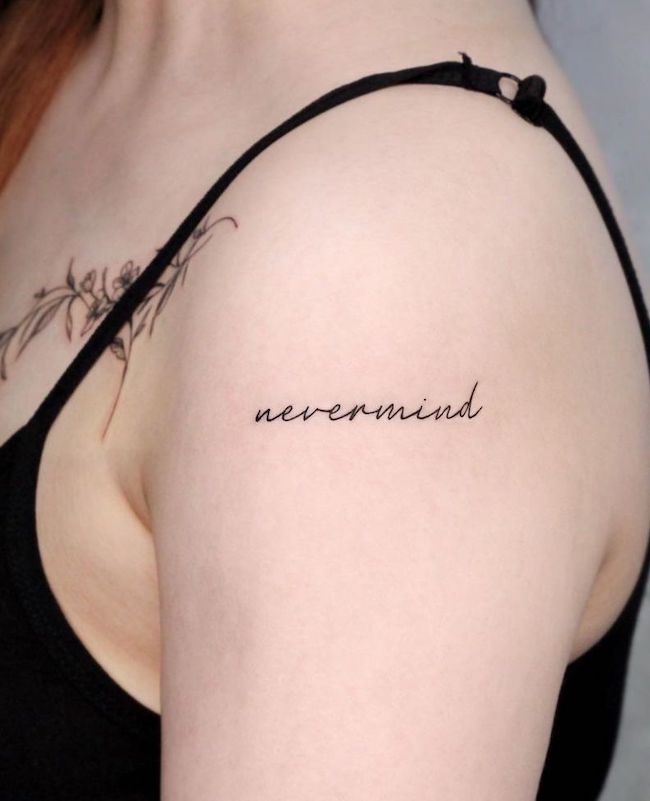 Tatuaggio di una parola Nevermind di @2an_tattoo