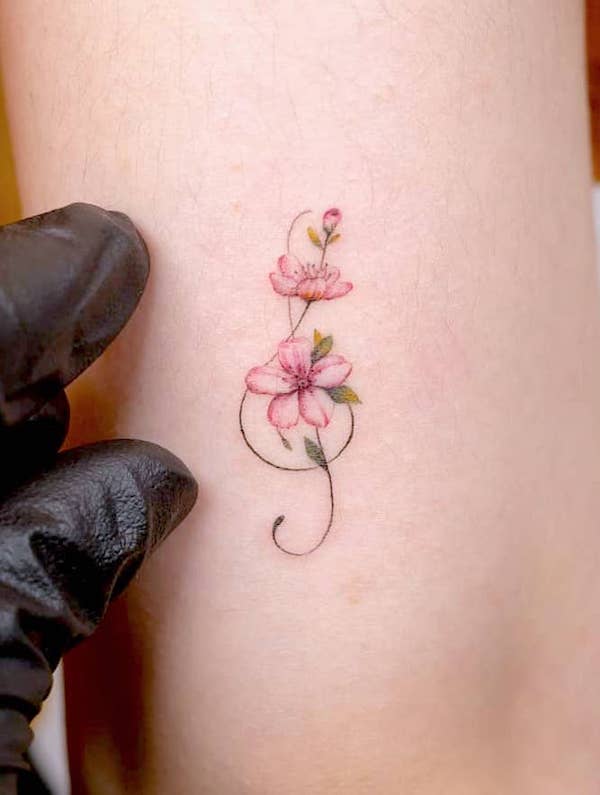 Cherry blossom note tattoo for music lovers by @handitrip- Tatuaggi di fiori di ciliegio con significato