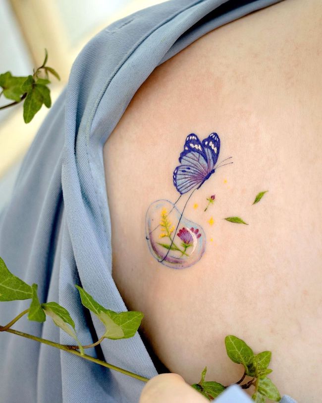 Il portatore di fiori di @ovenlee.tattoo