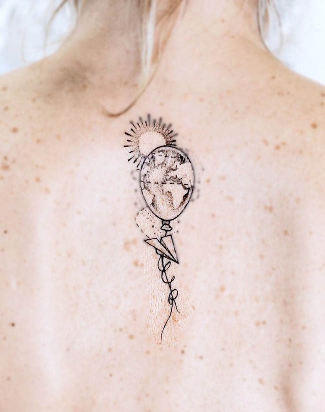 Tatuaggio hot ballon sulla nuca di @unpointsept