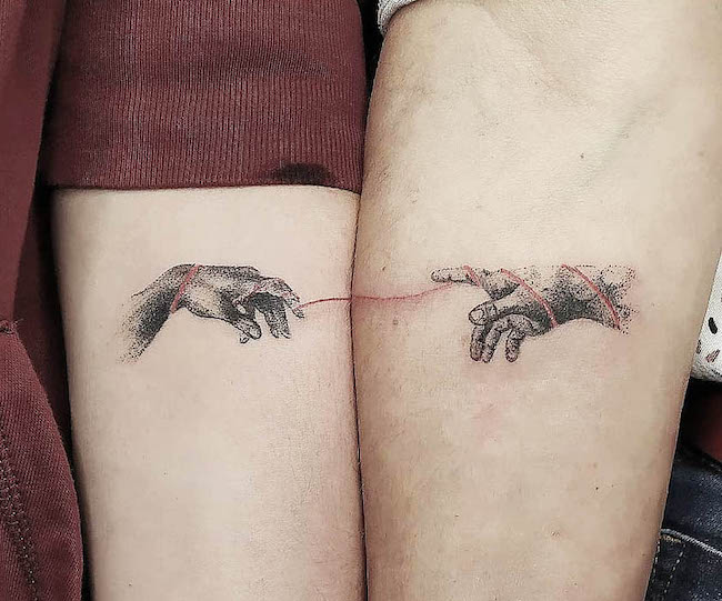 La creazione di Adamo - Tatuaggi familiari abbinati di @elodie.tattoo