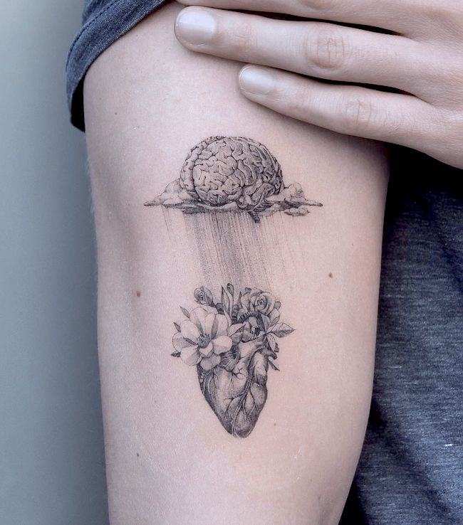 Trust your brain follow your heart un tatuaggio significativo di @ghinkos