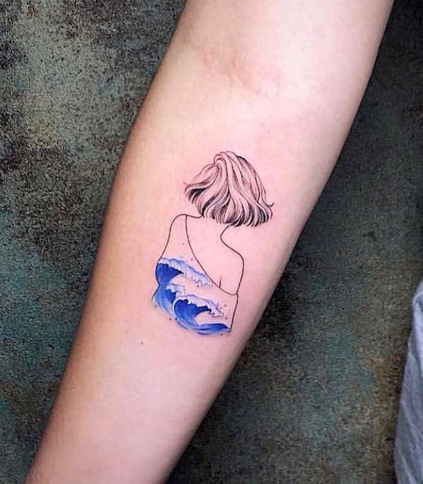 Don't look back - un tatuaggio minimalista a colori di @tattooist_tramolive