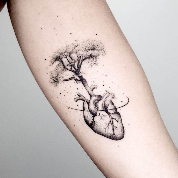 Albero e cuore di @klax.tattooer