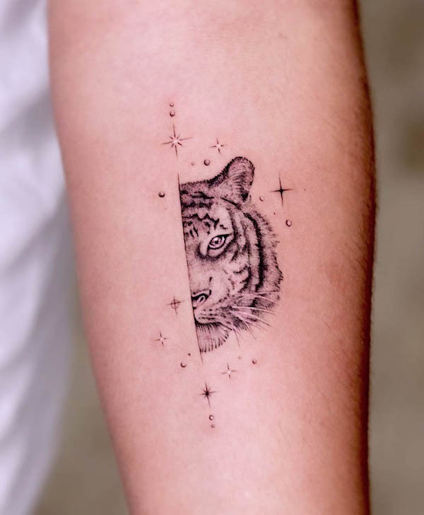 Tatuaggio mezza faccia di tigre di @m.burguete