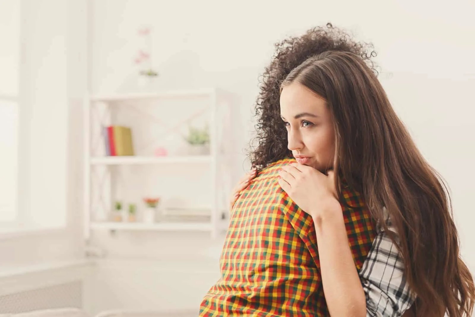 friends hug in the house.jpg Veronica Tudor